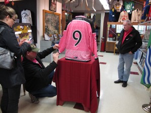 Fans admiring the 2016 version of the Petes Pink in the Rink sweater