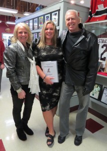 Hall of Fame members Nancy, Dan Sharpe with their daughter- inductee Tara Sharpe