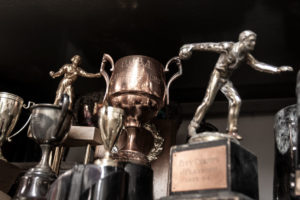 Image of trophies on shelf